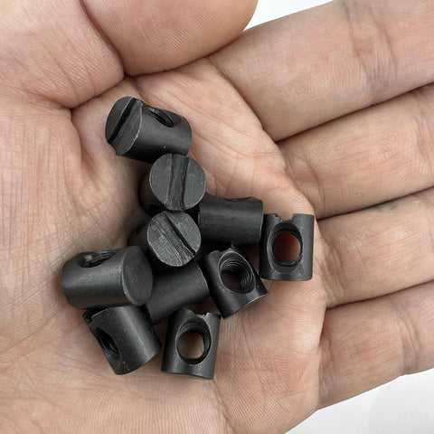 10 Pcs M6 Barrel Nuts 10x12mm For M6-1 Bolts, black steel fasteners in hand, used for cribs and furniture wood joints