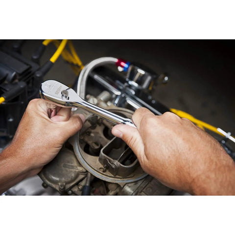 Person using Three Eighth Inch Drive 120XP Teardrop Ratchet Eight And A Quarter Inch Length Sixty Tooth Gear with engine