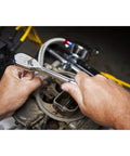 Using Three Eighths Inch Drive Flex Head Teardrop Ratchet With 120XP, 60-Tooth Gear for precise fastening in engine