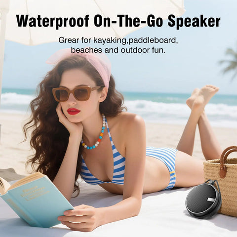 Rugged IP67 Waterproof Bluetooth Speaker With Submersible Design, Portable Tiny Speaker With TF Card Support at the beach.