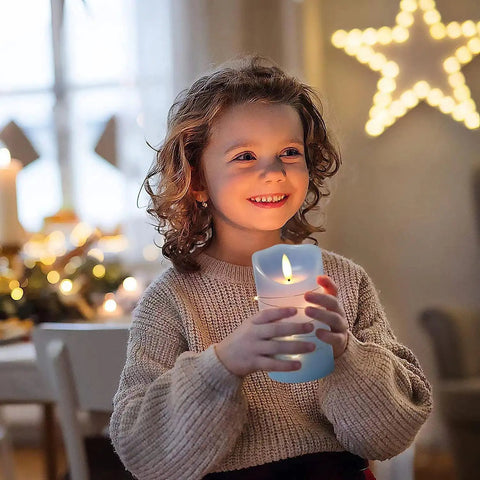 Child holding Sky Blue LED Flameless Candle Set With Embedded Starlight String in cozy home setting