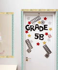 Travel The Map Bulletin Board Border With Globes For Classroom And Home Office Decor on a Grade 5B classroom door