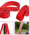 Two Pack 29 Inch Rim Tape For Road And Mountain Bikes, 13mm Wide, 0.5mm Thick, PVC Rim Strip Tape, Red Color, coiled on a table.