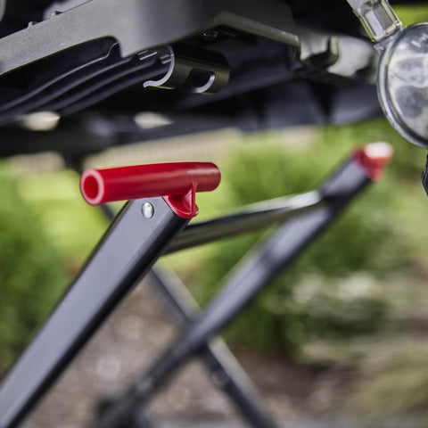 Close-up of Portable Folding Grill Cart With All Terrain Wheels For On The Go Grillin Heavy Duty Strap Keeps Your Grill Secured