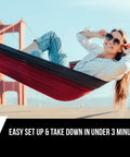 Woman relaxing in Two Person Camping Hammock, Super Easy Setup And Take Down, 10 Ft Long By 6 Ft Wide, with bridge view