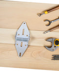 Garage door hinge plate, heavy-duty silver metal with mounting holes on a wood surface