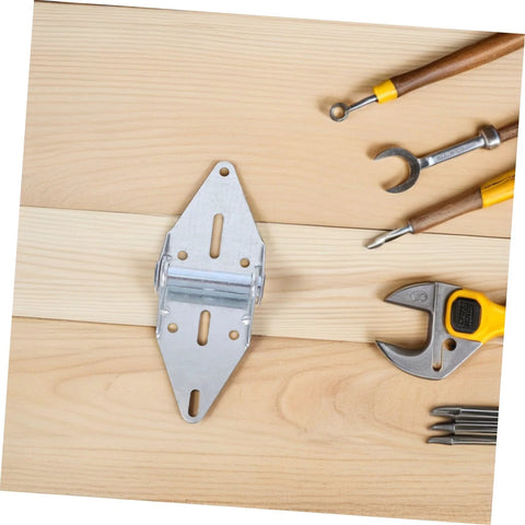 Garage door hinge plate, heavy-duty silver metal with mounting holes on a wood surface