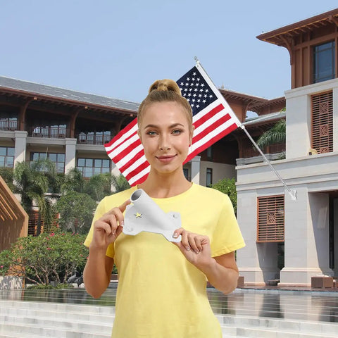 Person holding Heavy Duty Flag Pole Holder Mounting Bracket For Outdoor Railings Decks And Walls, Carbon Steel With Dual Layer Rust Resistant Coating, 1 Inch Inner Diameter, Easy Install, Built Tough For Home.