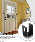 Heavy Duty U Shaped Door Barricade Bracket For 2x4 Openings installed on white door with black finish in home setting