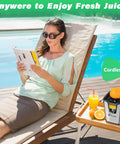 Woman relaxing by poolside using Pramedia Cordless Electric Citrus Juicer 60W Stainless Steel for fresh juice.