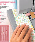 Seam Guide For Sewing Machine, Universal Quilting Accessory And Fabric Alignment Tool in use with floral fabric on sewing machine.