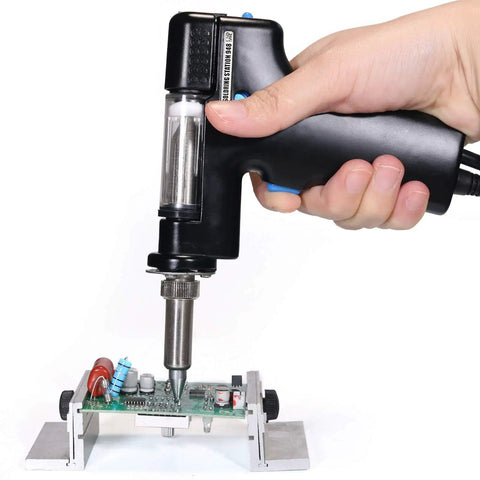 Replacement Desoldering Gun Handpiece For 948 And 948-II Soldering Stations in use on circuit board, black handle, durable suction tip