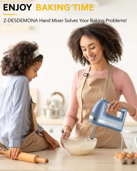 No Drama Electric Hand Mixer Featuring Five Speed Settings And Turbo Boost in use by a person mixing batter in a bowl.
