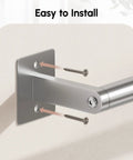 Close-up of brushed gold bathroom accessories set 24 inch towel bar wall mounted with screws for installation detail.