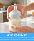 Rock Solid Replacement Collar Rings For Baby Bottles being securely fastened to a glass bottle containing milk.