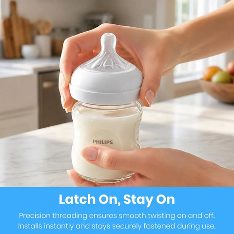 Rock Solid Replacement Collar Rings For Baby Bottles being securely fastened to a glass bottle containing milk.
