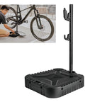 All In One Bike Storage And Charging Station With Adjustable Tool Organizer Box, Modular Add On Support, 77 Lb Capacity, Aluminum Frame For Home Or Garage Setup, featuring a black aluminum frame with tool organizer and vertical bike stand for maintenance.