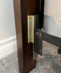 Four Piece Bed Frame Conversion Bracket Kit Featuring Sweet Headboard Swap Hardware attached to vintage bed frame and metal connector.