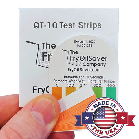 Hand holding Quat Sanitizer Test Strips for Food Service, color chart visible, Made in USA label, QT-10 instructions