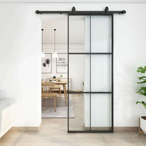 Three Panel Glass Sliding Barn Door 30x84 Inches, Black Aluminum Frame With Clear Tempered Glass installed in dining room