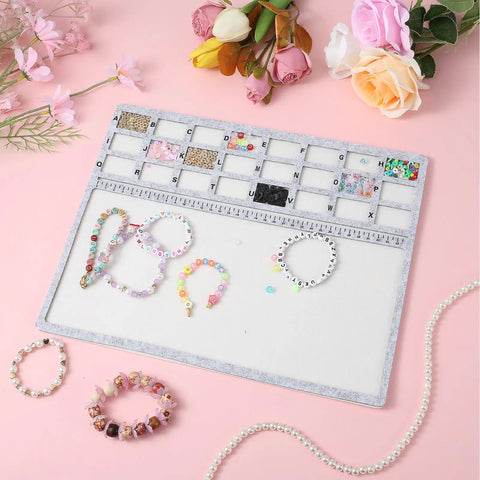 Solid Felt Beading Mat Featuring Sweet Non Slip Flocking Independent Grids Plus Centimeter Tracker For Jewelry Making with assorted beads and bracelets.
