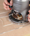 Close-up of router using Top Shelf 11 Piece Solid Brass Router Bushing Set And Template Guide Kit for clean edge profiling.