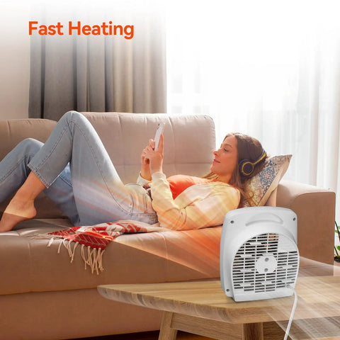 Portable 1500W Space Heater With Adjustable Thermostat And Overheat Protection on a table near a woman on a couch