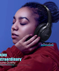 Over Ear Bluetooth Headphones with Badass 65 Hour Battery Hifi Stereo Sound That Knocks Your Socks Off in use with plush cushions.