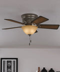 Conroy Onyx Bengal 42 Inch Low Profile Ceiling Fan With LED Light Kit And Pull Chain in a modern living room setting