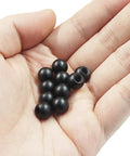 10 Pack M4 Thread Cap Nuts Black Carbon Steel Decorative Screw Caps for Lamps held in hand showing size and shape