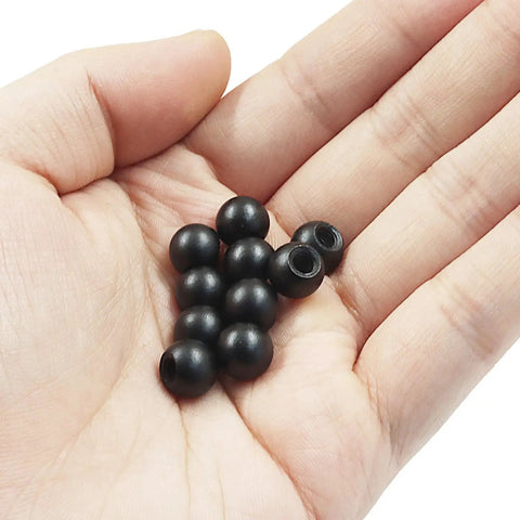 10 Pack M4 Thread Cap Nuts Black Carbon Steel Decorative Screw Caps for Lamps held in hand showing size and shape
