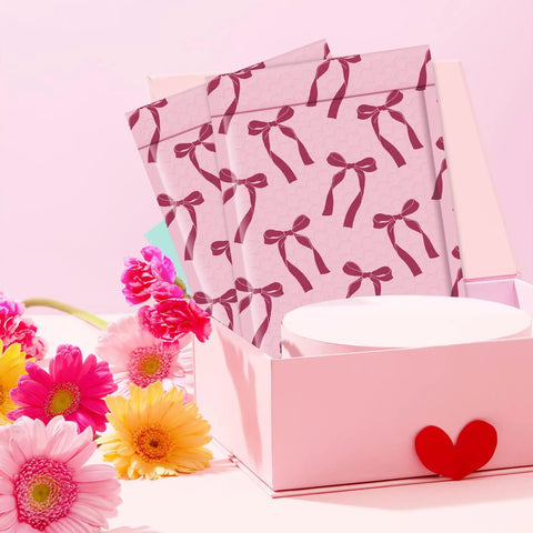 Pink Bows Bubble Mailers Set 6x10 Outer 6x9 Inner Padded Envelopes displayed in a pink box with decorative flowers