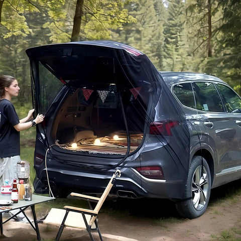 Tailgate Mesh Screen For SUV And Minivan, camping setup with mosquito protection and ventilation, attached to SUV tailgate in forest