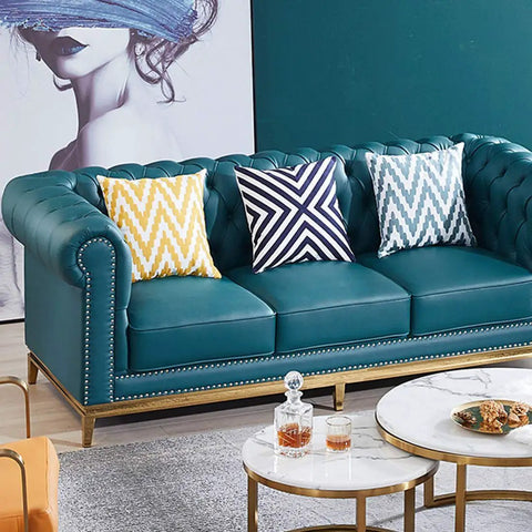 Badass Rock Solid 200 Piece Antique Upholstery Tacks And Furniture Nails Pin Assortment Kit In Classic Silver on teal tufted sofa with pillows.