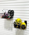Heavy Duty Slatwall Baskets For Garage And Workshop 15 Inch Large Wire Storage Bins Rugged Slatwall Organizers Wall Mounted Bins 2 Pack Holds Up To 66 Pounds Anti Slip Rubberized Wire Tough As Nails shown mounted on wall with stored sports gear and tools