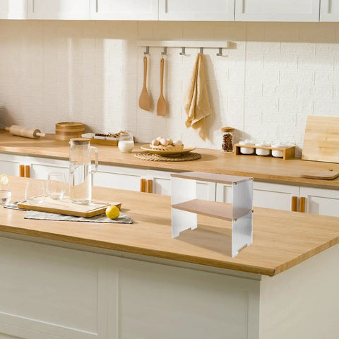 Clear The Counter Clutter With This Slick Wooden Acrylic Display Shelf on a kitchen countertop, showcasing its tiered design.