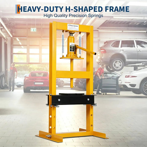 Heavy Duty 6 Ton Hydraulic Shop Press With Sturdy H Frame Design, yellow frame in garage setting for metalworking and pressing tasks.