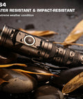 Rechargeable 1400 Lumen LED EDC Flashlight With 90 Degree Swivel Head on wet rocks, showcasing water resistance.