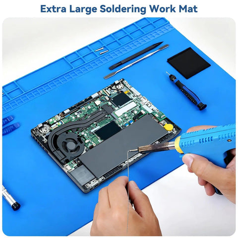 Monster Sized Extra Large Soldering Mat For Electronics Repair 27.6 By 15.7 Inches, hands soldering laptop on blue mat