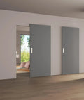 30X84 Inch Flush White Primed Barn Door With Invisible Hidden Track And Soft Close Hardware Kit shown in modern interior setting.