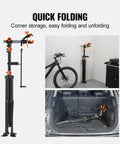 Heavy Duty Bike Repair Stand With Four Leg Base Adjustable 42.5 To 74.8 Inch Height Foldable Maintenance Stand With Magnetic Tool Tray Steel Construction 80 Lb Capacity Built For Home Garage And Shop shown folded, standing, and stored in car trunk.