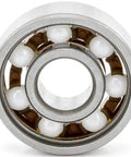 Top Shelf 608 Open Style Deep Groove Radial Ceramic Ball Bearings Bulk Pack Of One Hundred Silicon Nitride Rings Measuring 8 By 22 By 7 Mm showing ceramic balls inside.