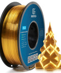 Geeetech Silk PLA filament spool, 1.75mm, metallic gold, 1 kg; side view with 1 gold 3D-printed tree