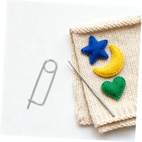 20pcs Stainless Steel Brooch Shape Cotter Pins Quick Lock Spring Safety Fasteners on fabric with felt shapes and crochet hook.