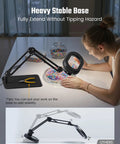 Woman using Crystal Clear 10X Square Magnifying Desk Lamp With Dimmable LED Light Clamp Or Base for crafting.