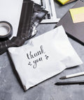 White poly mailer with 'thank you' text, part of 200 Pack Poly Mailers With Four Assorted Sizes 10 By 6 Inches, 11.8 By 7.8 Inches, 13.7 By 9.8 Inches, And 16.6 By 11.4 Inches Waterproof Tear Resistant White Shipping Envelopes For Clothes Books And More.