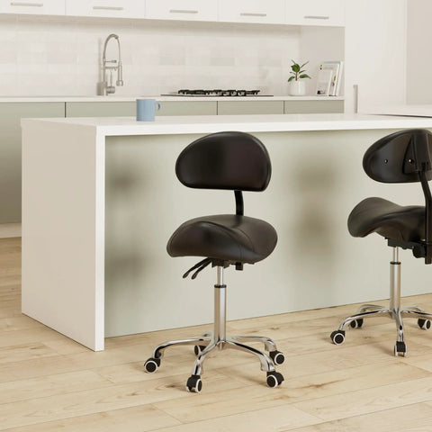 Saddle Stool On Wheels With Backrest Rolling Height Adjustable Ergonomic Saddle Chair in a modern kitchen setting