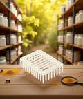 Queen Marker Cage Clip For Beekeeping Plastic Queen Catcher Tool on wooden table with jars and yellow powder