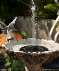 Sun Powered Bird Bath Fountain Pump With Four Nozzles And A 1.4W Solar Panel Kit Submersible Water Pump in stone basin