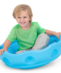 Child playing on Two Sided Rock Around Wobble Disk And Climbing Dome For Toddlers And Kids, Rocking And Climbing Fun, Blue